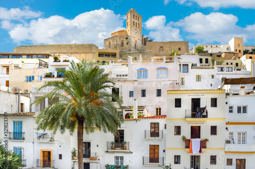 View of the old town of Ibiza, Spain. Dalt Vila historical town in a sunny day. Travel destinations, mediterranean and vacation concept.