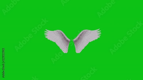Fluffy white 3D animated angel wings with fairy tale beautiful feathers flapping on a green screen background