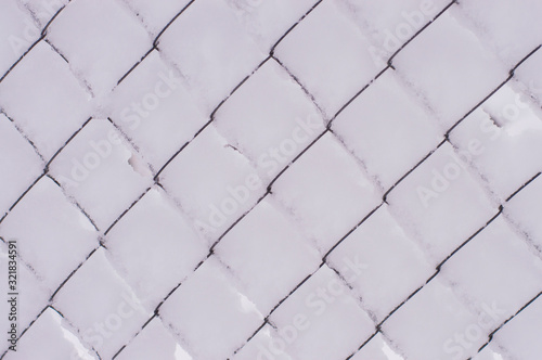 texture iron mesh covered with snow
