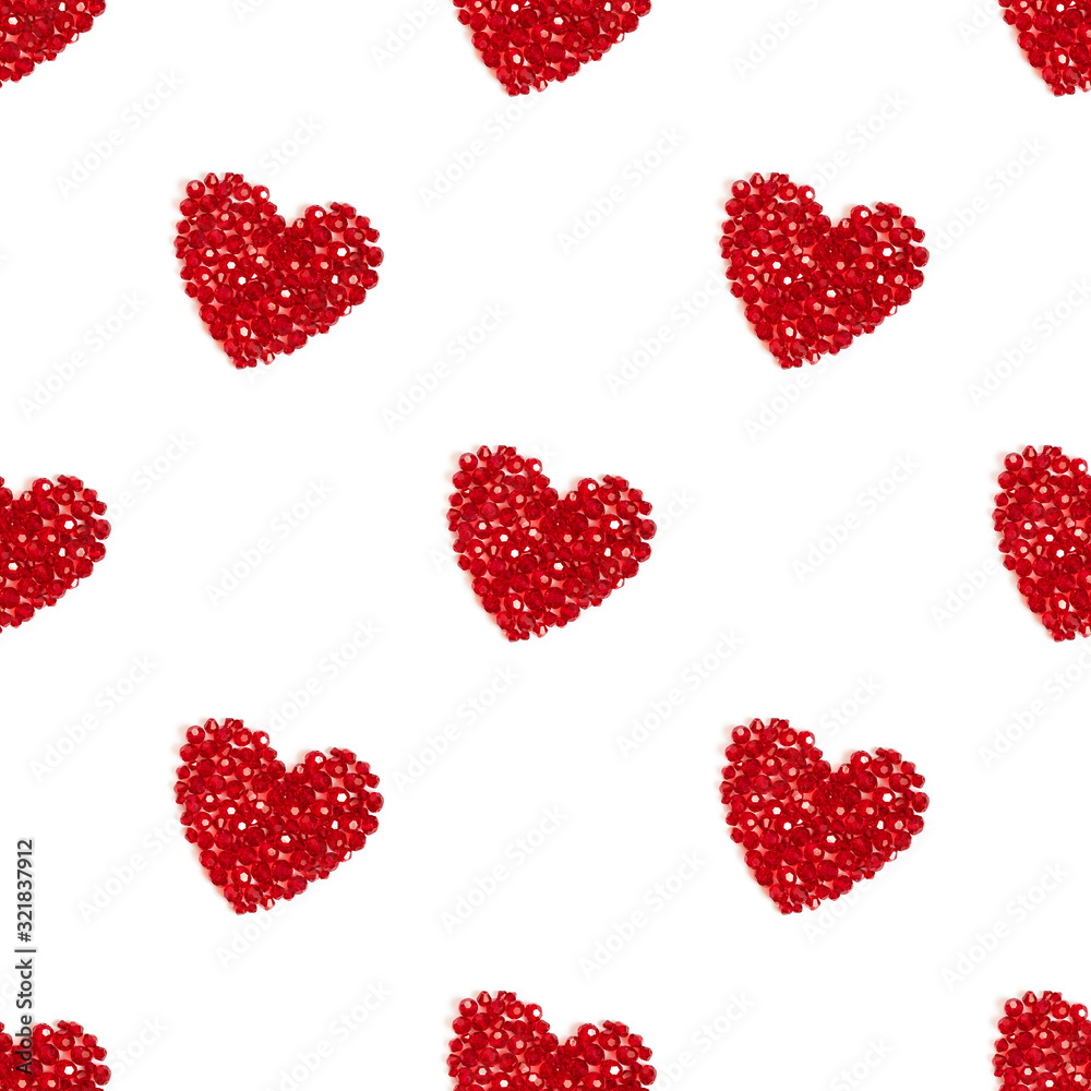 Seamless pattern with red hearts on a white background. Shiny hearts made of beads. Valentines day concept. Seamless pattern with red hearts on a white background. Shiny hearts made of beads. Valentines day concept.