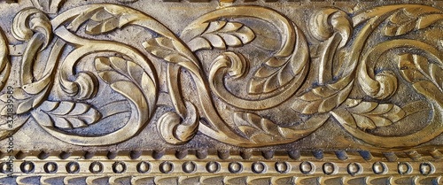 floral pattern carved in bronze at the monastery Mihai the Brave in Turda city Romania 08.02.2020
