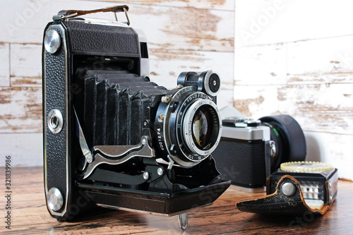 Vintage cameras and photo exposure meter