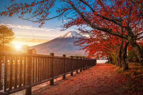 Mt. Fuji over Lake Kawaguchiko with autumn foliage at sunrise in Fujikawaguchiko, Japan. © nuttawutnuy