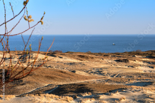Sunset view of nordic dunes and Baltic sea at Curonian spit, Nida, Klaipeda, Lithuania