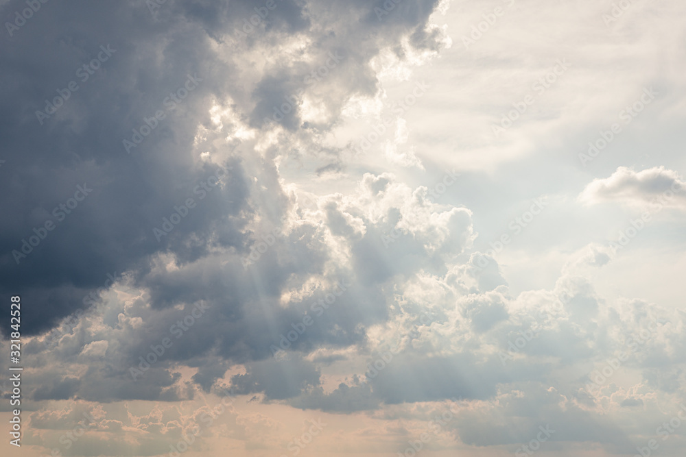 Sunbeam between storm clouds cloudscape sky - obrazy, fototapety, plakaty 