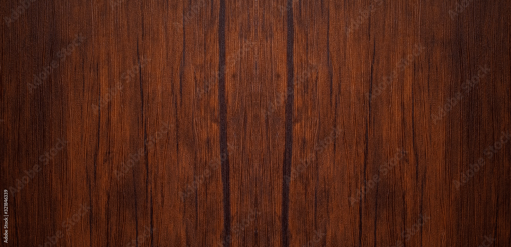 Seamless dark brown wooden board texture background with vignette