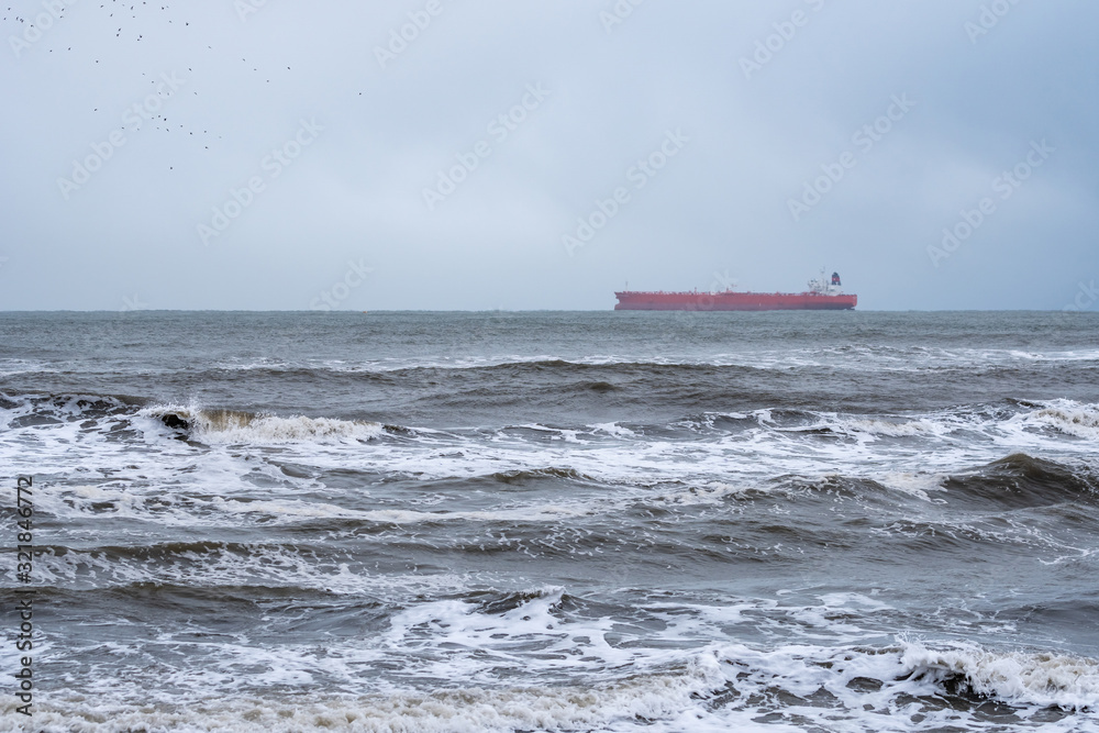 Tanker ship at sea during a storm.