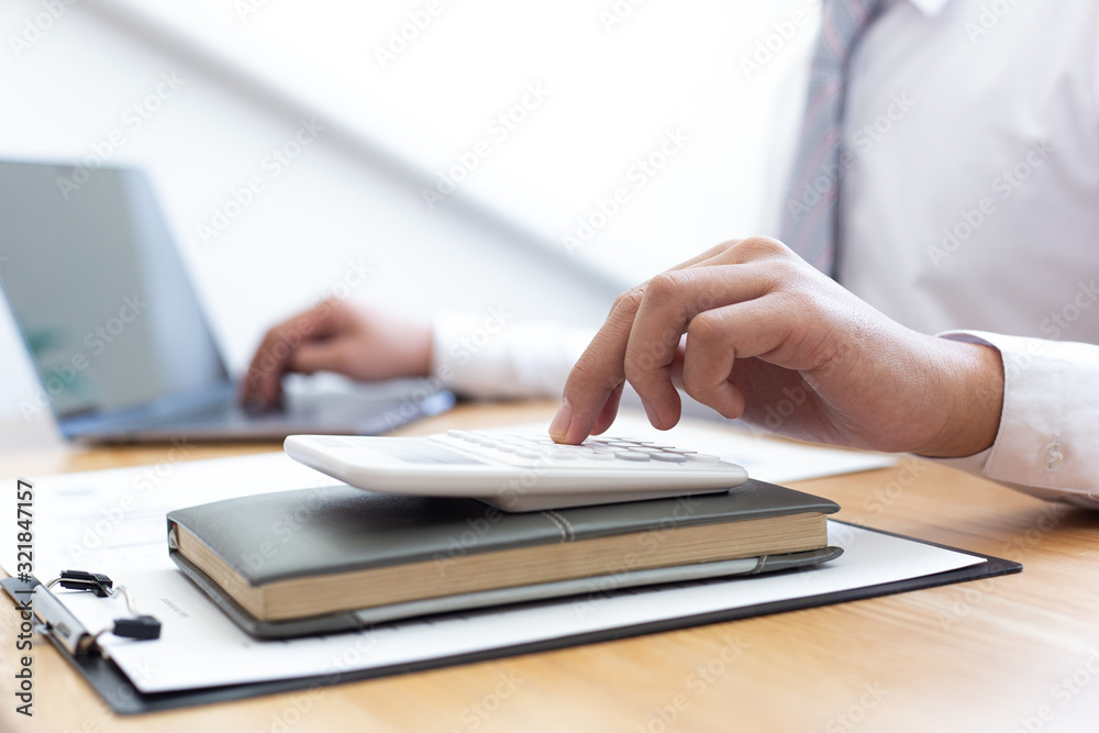 Businessmen use graphs to summarize results and calculate income-expenses to find financial balance points and use them to improve and advance business, finance and economic concepts. Businessmen use graphs to summarize results and calculate income-expenses to find financial balance points and use them to improve and advance business, finance and economic concepts.