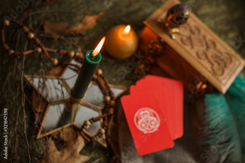 Mystical atmosphere, view of candle on the table, esoteric concept, fortune telling and predictions