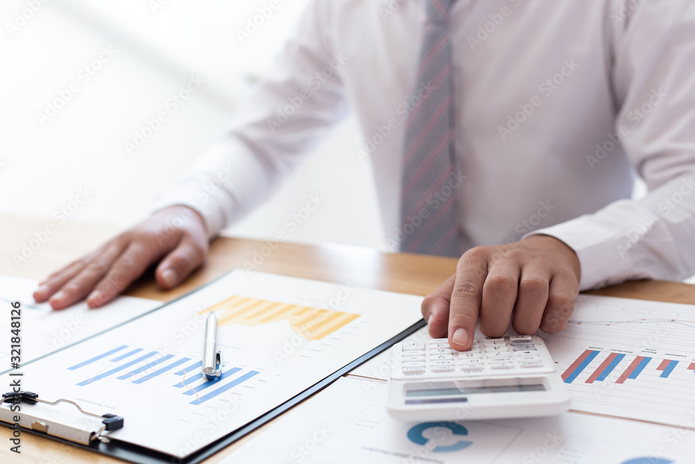 Businessmen use graphs to summarize results and calculate income-expenses to find financial balance points and use them to improve and advance business, finance and economic concepts.