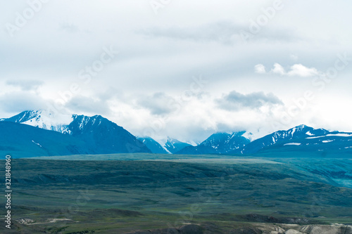 Background image of a mountain landscape. Russia  Siberia  Altai