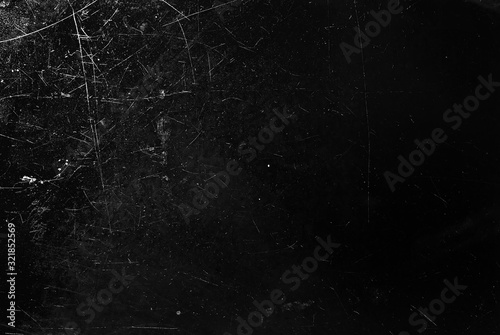 White scratches and dust on black background. Old dirty glass. photo