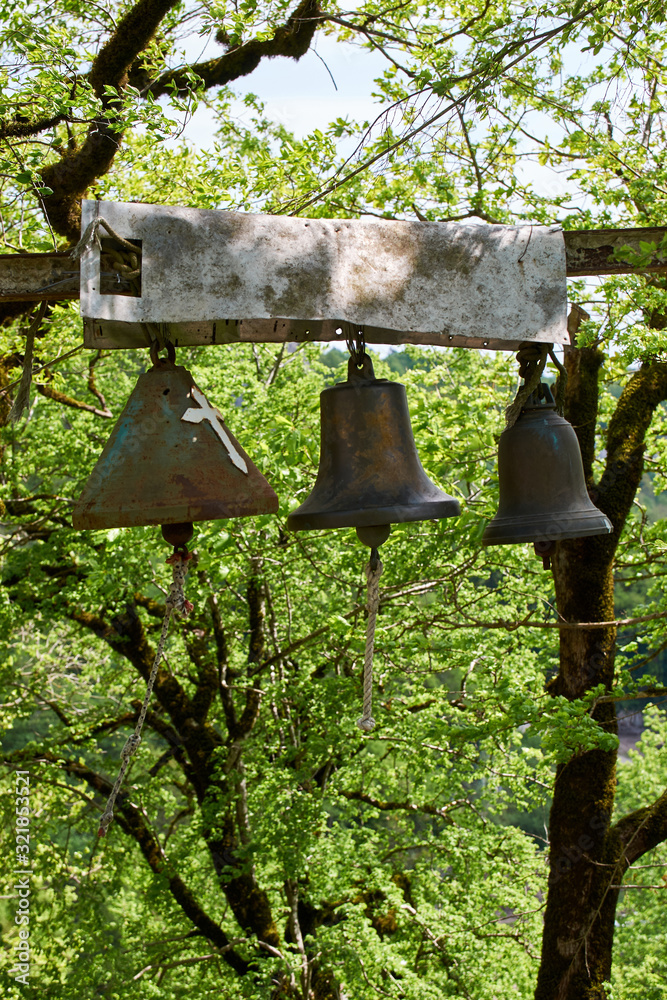 Fototapeta premium A three old bronze bells