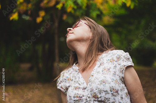 Young woman enjoying a tranquil scene