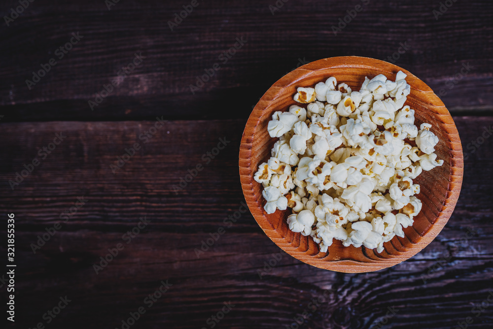 Popcorn in wood dish Popcorn in wood dish