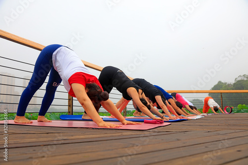 Yoga practitioners in the park,Luannan County, Hebei Province, China