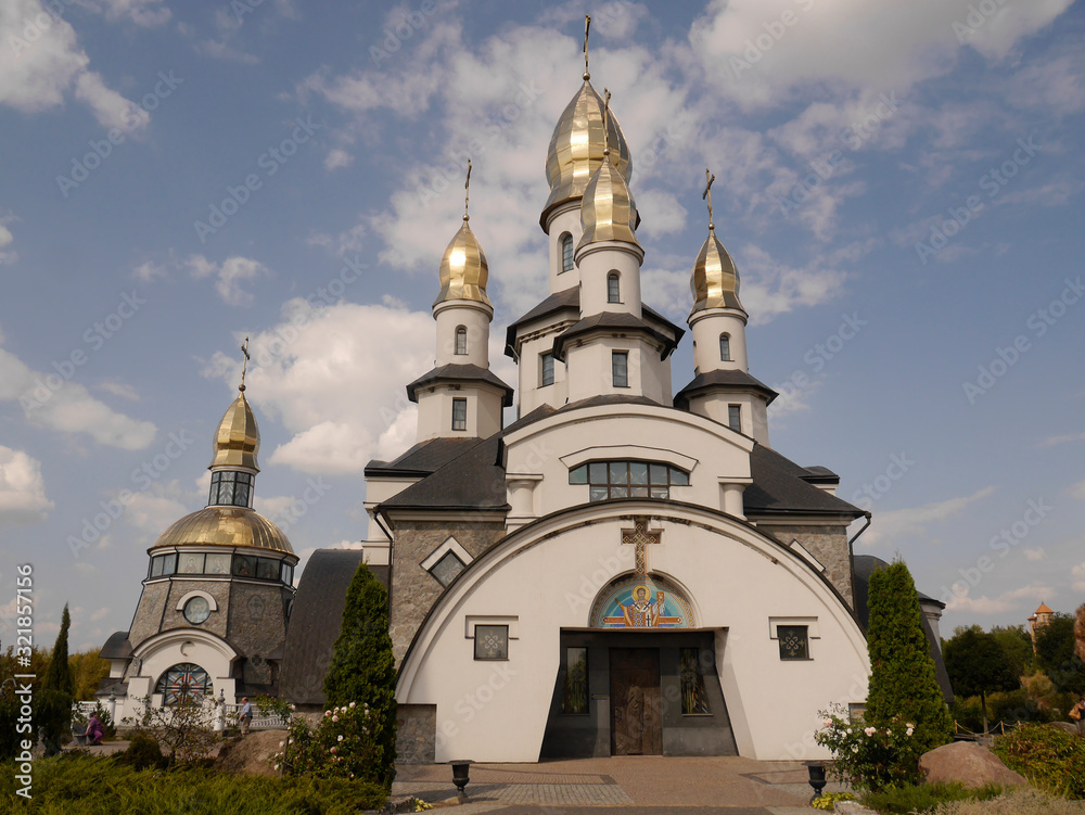 Temple, Church of St. Eugene, Buki, Ukraine. Temple complex with landscape park in Buki village.
