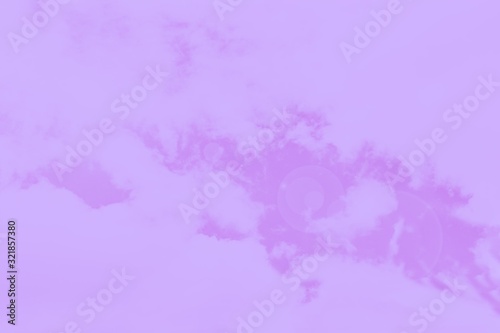 Purple violet sky background with clouds and sun glare, toned
