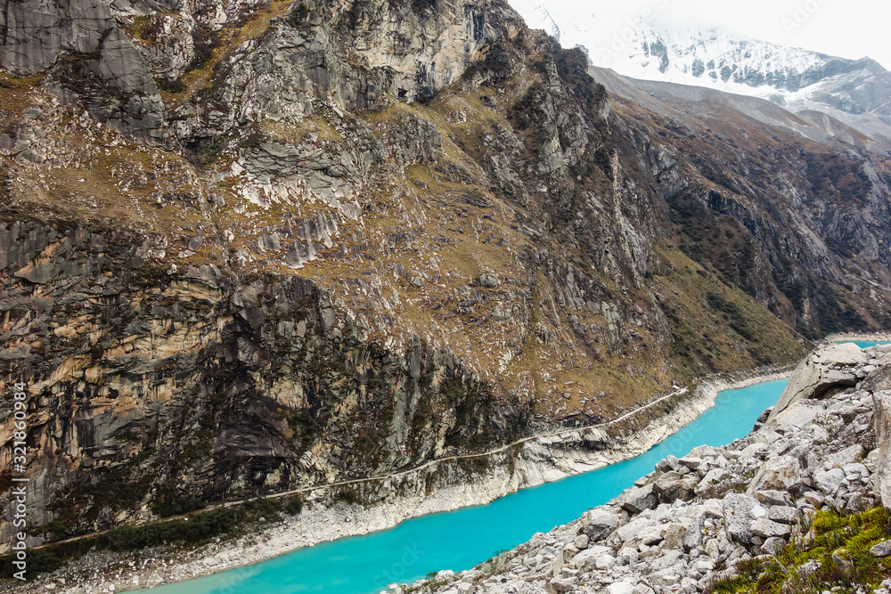 Paron lagoon, at Huascaran National Park, Peru. A green lake in the Cordillera Blanca on the Peruvian Andes