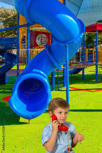 Handsome blond boy with blue eyes photo