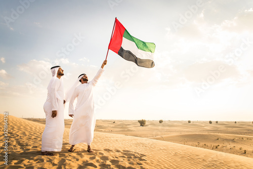 Arabic men in the desert photo