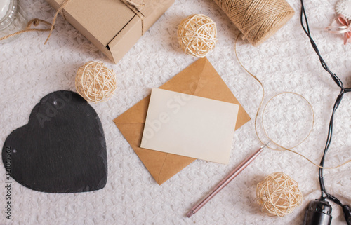 girl writes love letter. card mockup with hand photo