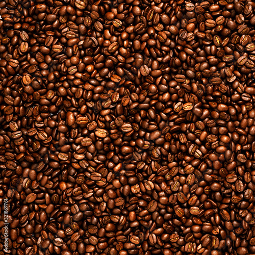 Coffee beans texture. Roasted coffee beans as background. Flat lay, top view, copy space © Vtr_stock