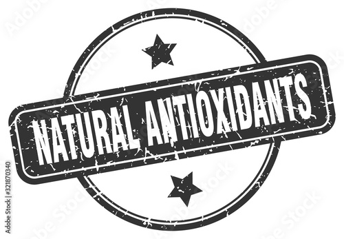 natural antioxidants stamp. natural antioxidants round vintage grunge sign. natural antioxidants