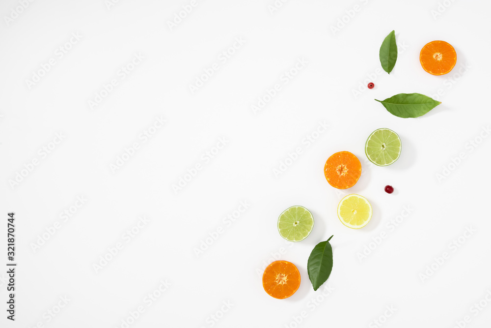 Citrus fruits pattern. Exotic fruits on white background. lemon, grapefruit, orange, lime, tangerine, fruit slices. Flat lay, top view, copy space