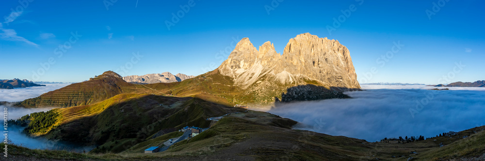 Panorama of cloud sea at Sella mountain pass between the provinces of Trentino and South Tyrol, Dolomites