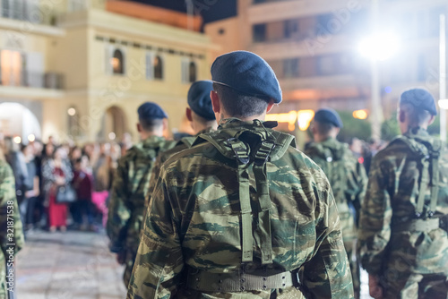 Easter celebration night outside Agios Minas Cathedral. A marching band and military parade in the old town of Heraklion.