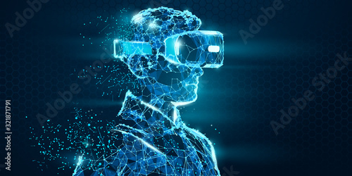 VR headset holographic low poly wireframe vector banner. Polygonal man wearing virtual reality glasses, helmet. VR games playing. Particles, dots, lines, triangles on blue background. Neon light. photo