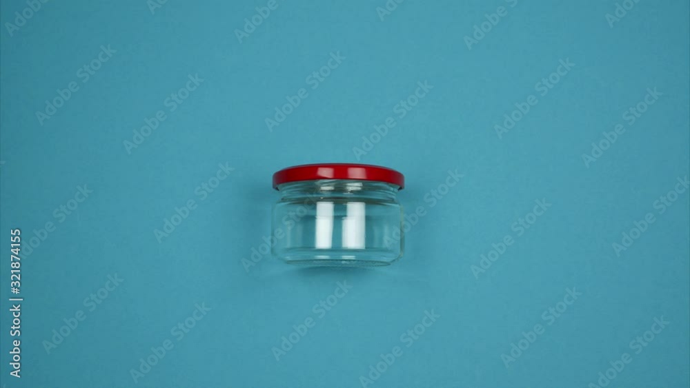 The plastic container turns into glass. Stop motion The plastic container turns into glass. Stop motion