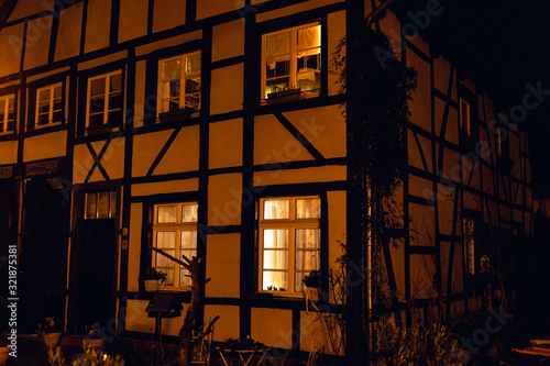 old town and houses calles WESTERHOLT ALTES DORF in HERTEN, GERMANY at night photo