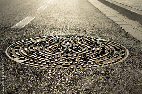 closeup of a manhole cover photo
