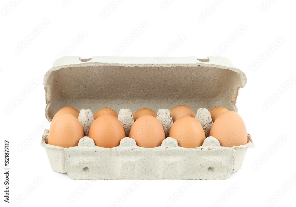 Raw chicken eggs in carton isolated on white