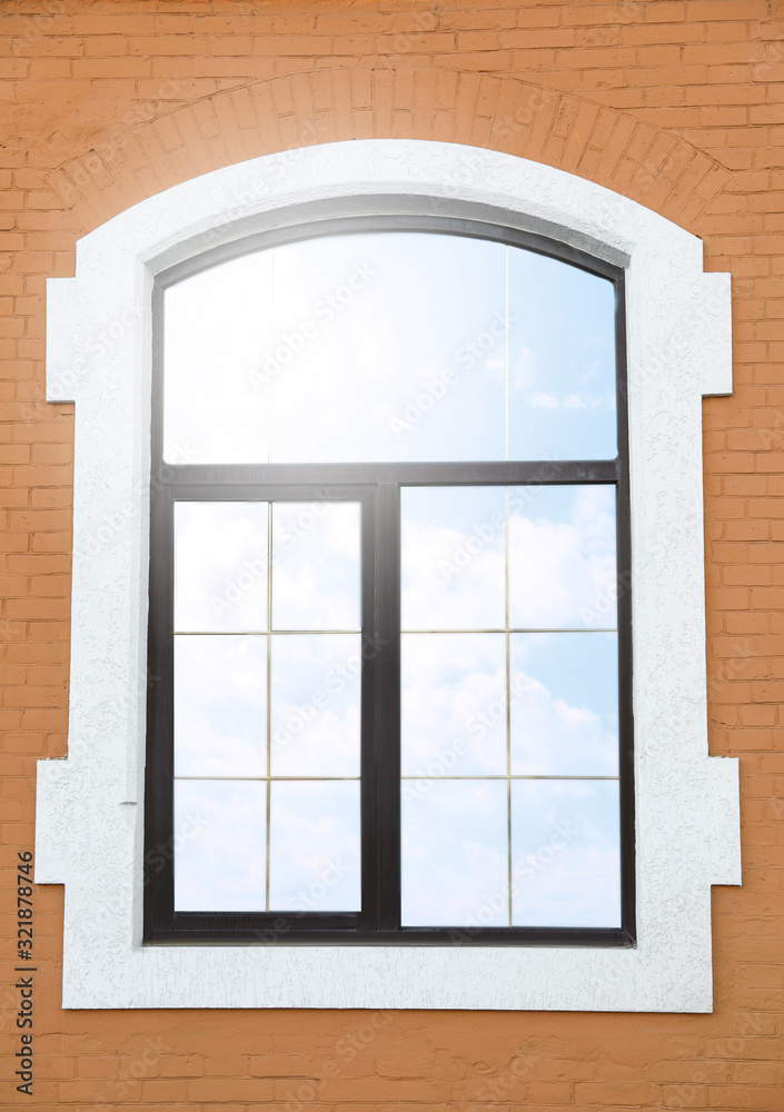 Brick building with beautiful modern arch window Brick building with beautiful modern arch window