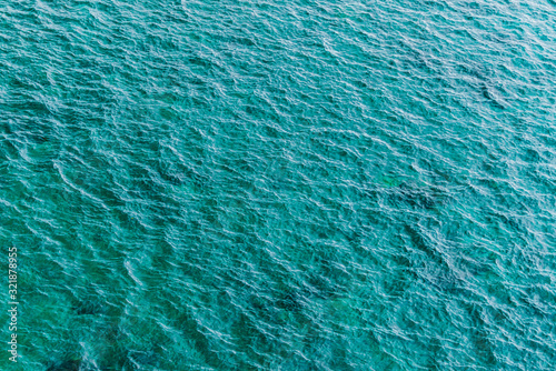 texture of blue water surface of the sea