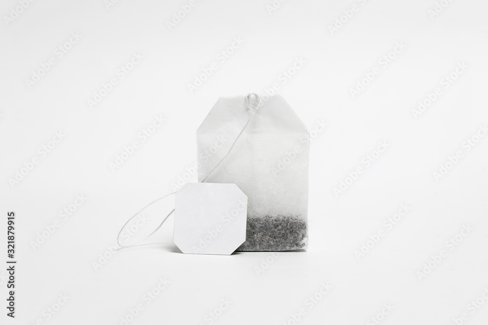 Close-up of Tea Bag Mock up with label isolated on white  background.Disposable Tea Bag.High resolution photo. Stock Photo | Adobe  Stock