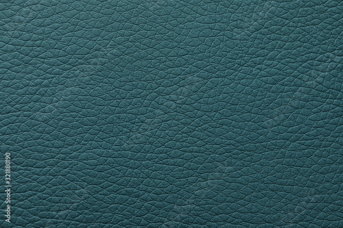 Texture of dark green leather as background, closeup