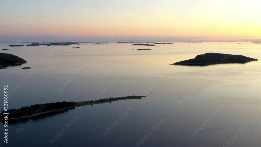 Aerial view of a sunset over a calm sea Aerial view of a sunset over a calm sea