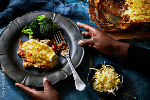 Vegetarian cottage pie slice on plate