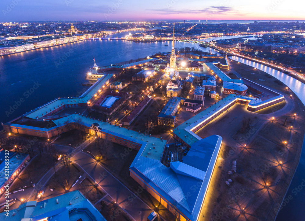 Obraz premium Beautiful night view of Saint-Petersburg, Russia, Peter and Paul Fortress with cityscape and scenery beyond the city