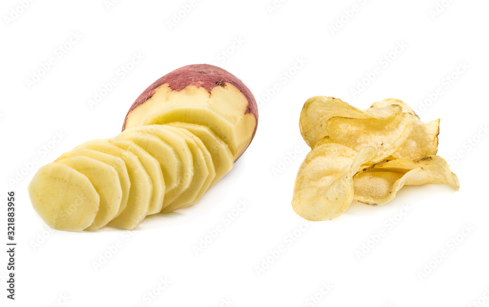Potatoes chips and raw sliced potato isolated