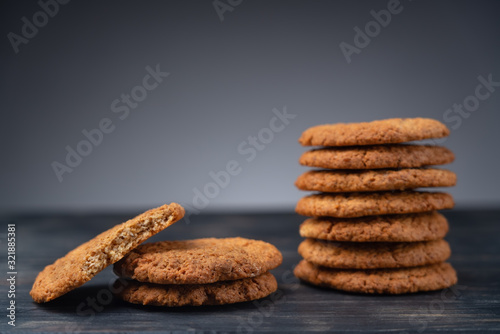 Homemade oatmeal cookies on a wooden background. Great healthy breakfast.