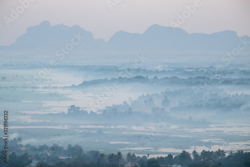 Watercolor view of foggy morning landscape. Hpa An, Myanmar (Burma)