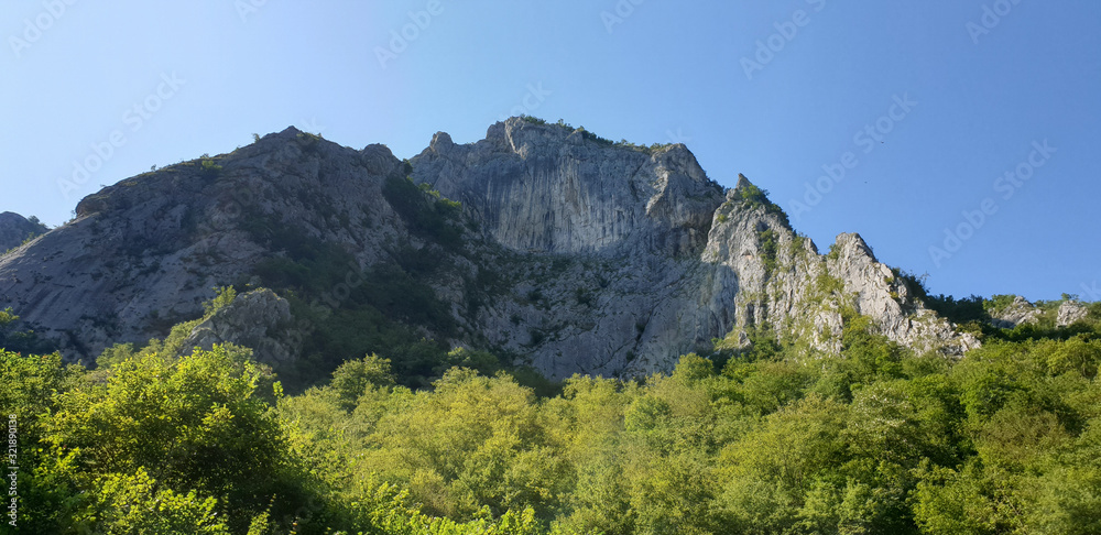 view of mountains and blue sky view of mountains and blue sky