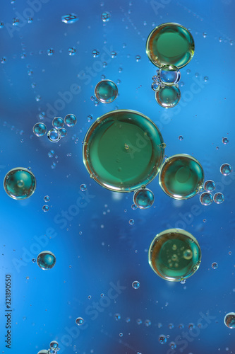 Green bubbles on blue background