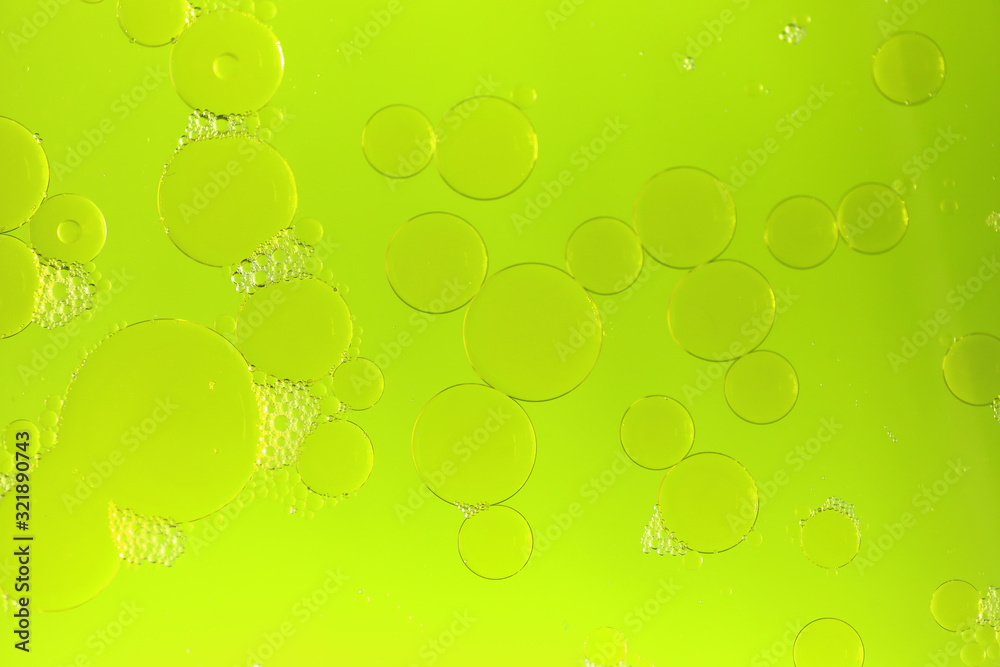 Green fluorescent background with bubbles
