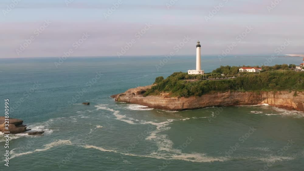Phare de Biarritz. Drone flight pulling back from lighthouse. Atlantic Ocean, Cape Hainsart, Biarritz, France. Phare de Biarritz. Drone flight pulling back from lighthouse. Atlantic Ocean, Cape Hainsart, Biarritz, France.